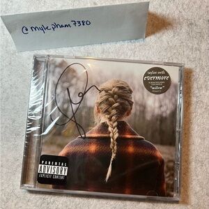 Autographed Taylor Swift’s Evermore Album